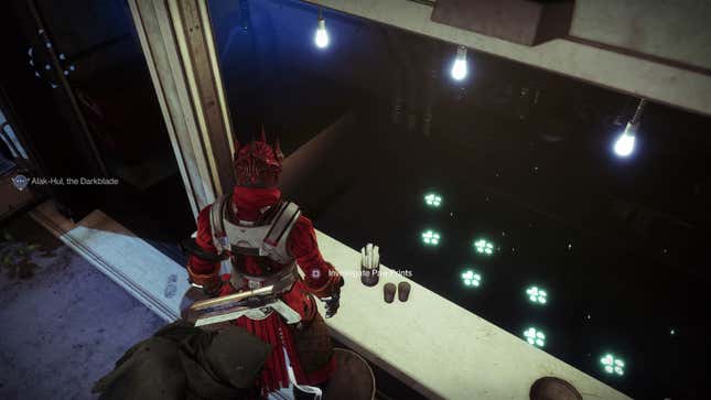 A Destiny guardian looks at some glowing paw prints, while a button prompt says Investigate Paw Prints.