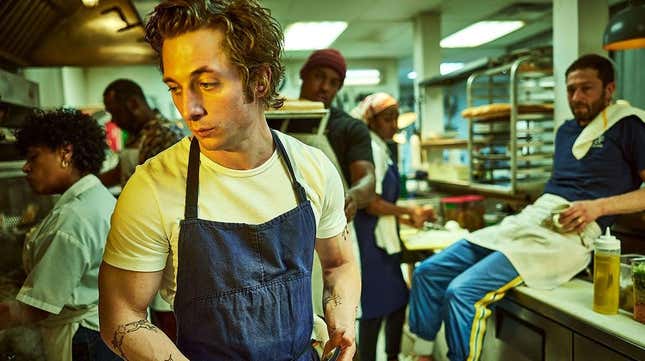 Jeremy Allen White stands in the kitchen.