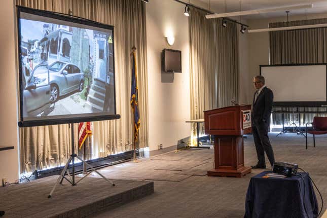 Philadelphia District Attorney Larry Krasner watches the body camera footage of former officer Mark Dial’s partner at a press conference announcing murder and other charges against Dial in the shooting and killing of 27-year-old Eddie Irizarry .