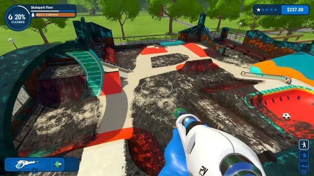 A screenshot of PowerWash Simulator showing the player's first-person perspective as they clean a skate park.