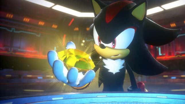 Shadow holds a yellow Chaos Emerald.