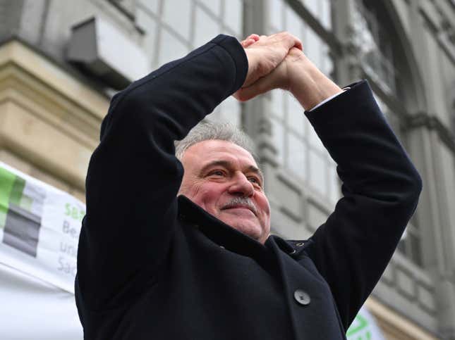 Chairman of the German Train Drivers&#39; Union (GDL) Claus Weselsky cheers after his speech to GDL members at a rally in front of the main railway station, in Dresden, Germany, Friday Jan. 26, 2024. The German Train Drivers&#39; Union (GDL) has called for another strike at Deutsche Bahn lasting several days. It is the fourth and by far the longest industrial action in the ongoing wage dispute at Deutsche Bahn. (Robert Michael/dpa via AP)