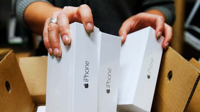 A photo of iPhones in their boxes.