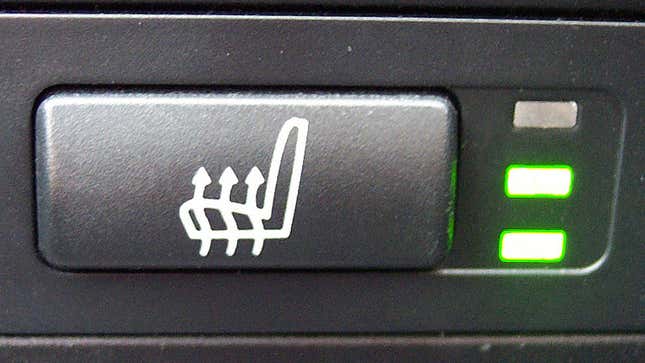 A photo of a heated seat control inside a car. 