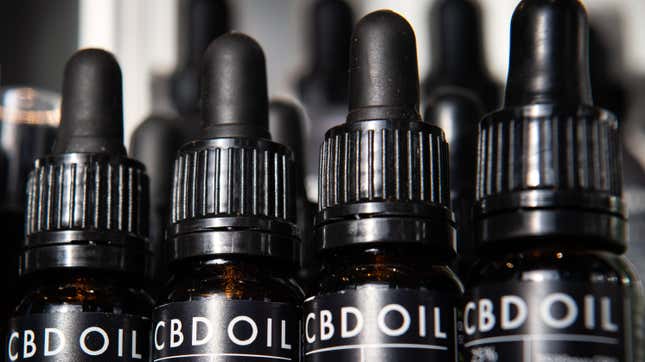  A row of bottles of CBD oil are seen in a branch of the health chain Planet Organic on February 17, 2020 in London, England. 