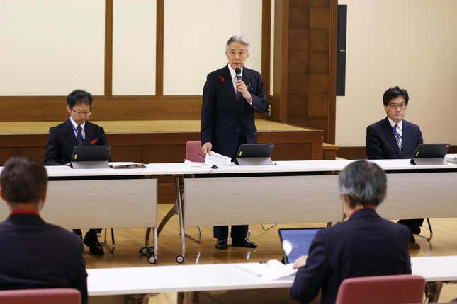 Japan&#39;s Education Minister Masahito Moriyama, center, speaks during a press conference in Tokyo Thursday, Oct. 12, 2023. Japan’s government is convening a religious affairs council on Thursday to ask experts to decide whether to seek a court order to revoke the legal status of the Unification Church. The church&#39;s fundraising tactics and cozy ties with the governing party have triggered public outrage. (Kyodo News via AP)