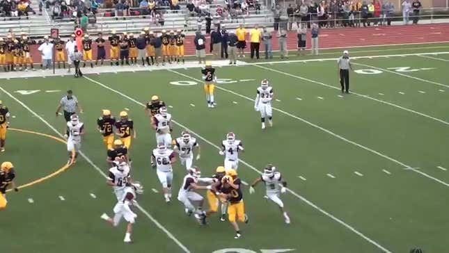 High School Football Player Gets Helmet Twisted Backwards, Leveled