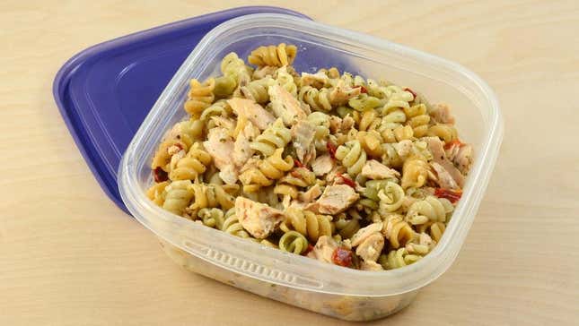 Baked salmon pasta in storage container