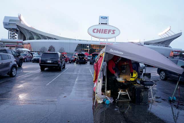 Fans tailgate outside of Arrowhead Stadium before an NFL wild-card playoff football game between the Kansas City Chiefs and the Miami Dolphins Saturday, Jan. 13, 2024 in Kansas City, Mo. (AP Photo/Charlie Riedel)