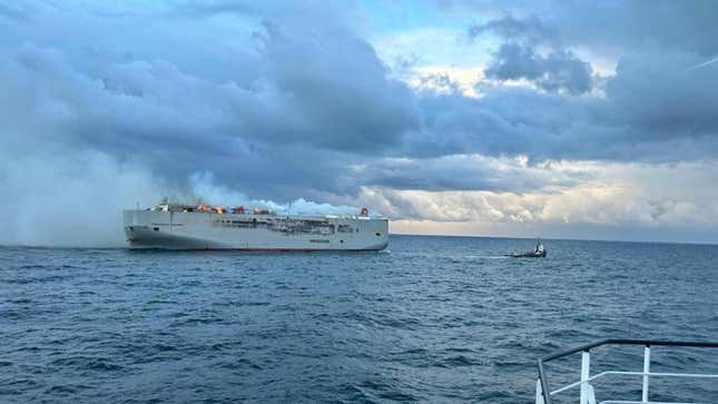 A photo of the smoking Fremantle Highway car carrying ship.