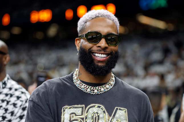 Odell Beckham Jr. poses for a photo on the sidelines before an NFL football game between the New Orleans Saints and the Tampa Bay Buccaneers, Sunday, Sept. 18, 2022, in New Orleans. 
