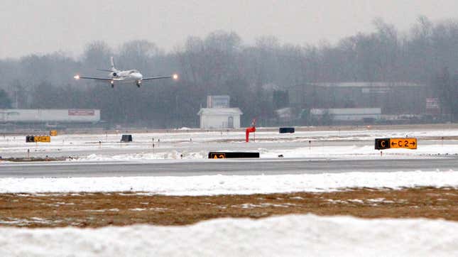 A plane lands at Bishop International Airport on January 21, 2016 in Flint, Michigan.