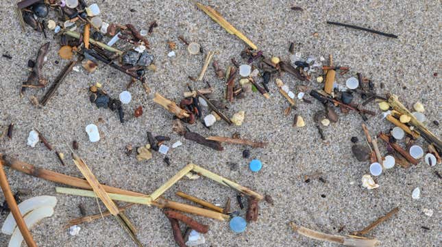 Small plastic particles were washed up by the waters of the North Sea on the beach of the west coast at Thy National Park in Denmark on February 2 2023. Photo: Patrick Pleul/picture-alliance/dpa (AP)