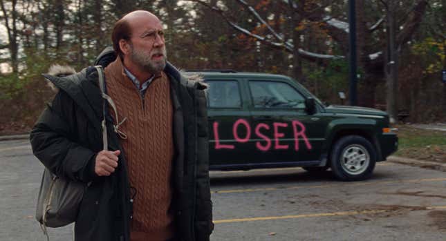 Paul with the word loser on his car.