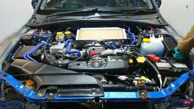 A photo of the engine bay in the Subaru WRX. 