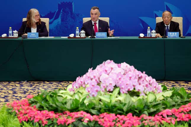 Australia&#39;s former Trade Minister Craig Emerson, center, speaks next to China&#39;s former Foreign Minister Li Zhaoxing, right, and Australia&#39;s Department of Foreign Affairs and Trade Secretary Jan Adams at the 7th China-Australia High Level Dialogue at the Diaoyutai State Guesthouse in Beijing Thursday, Sept. 7, 2023. (Florence Lo/Pool Photo via AP)