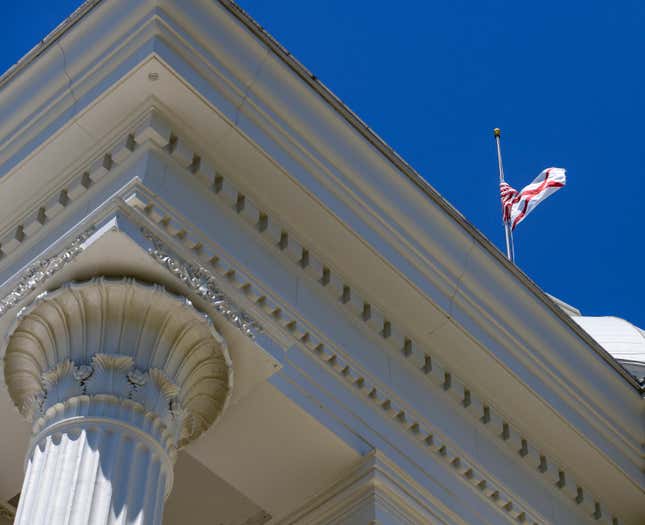 The Alabama flag flies over the the Alabama State Capitol on May 15, 2019 in Montgomery, Alabama. 