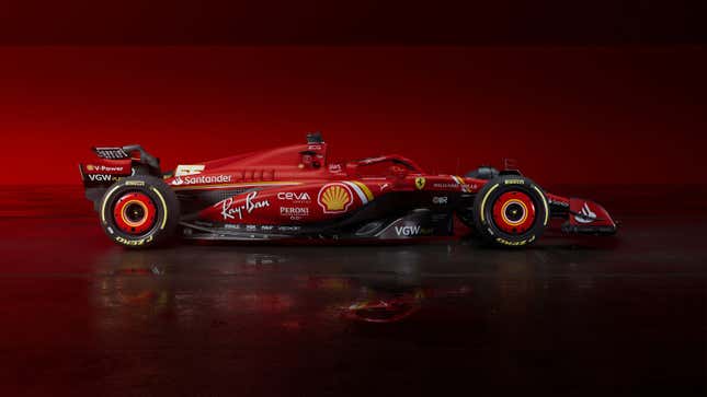 A side photo of the Red Ferrari F1 car. 