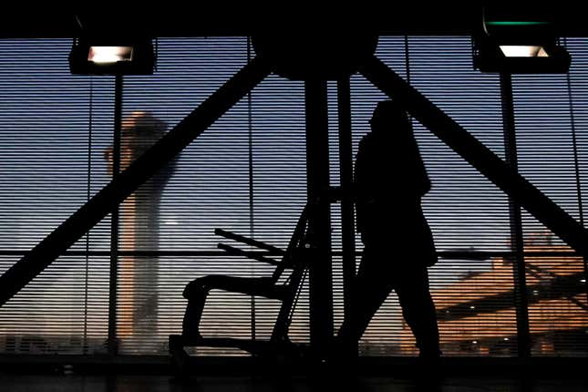 FILE - An airline employee transfers a wheelchair to her station at O&#39;Hare International Airport in Chicago, Nov. 23, 2022. The Biden administration will propose Thursday, Feb. 29, 2024, to make it easier for the government to fine airlines for damaging or misplacing wheelchairs by making it an automatic violation of a federal law on accessible air travel. (AP Photo/Nam Y. Huh, File)