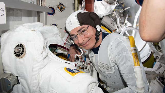 Astronaut Mark Vande Hei conducting a spacesuit fit check on August 17, 2021.