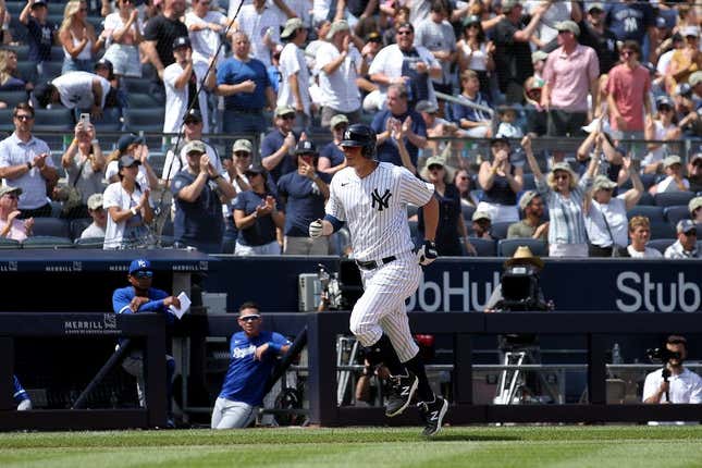 Aaron Judge of the New York Yankees rounds the bases after hitting a  two-run homer during the first inning of a baseball game against the Los  Angeles Angels at Yankee Stadium in