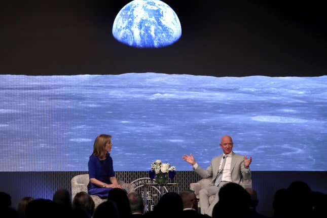 Caroline Kennedy and Amazon founder Jeff Bezos at the symposium on the 1969 moon landing at the JFK Presidential Library in Boston. 