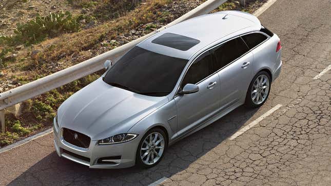 A photo of a silver Jaguar XF station wagon. 