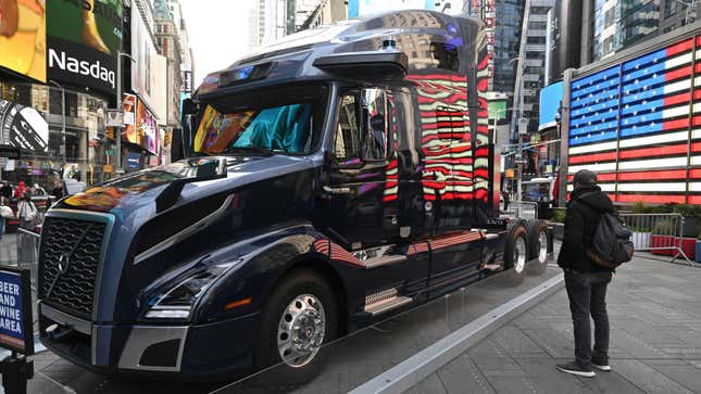 Autonomous-vehicle technology company Aurora Innovation Inc. displays driverless vehicles in Times Square in New York City during their debut on the Nasdaq.