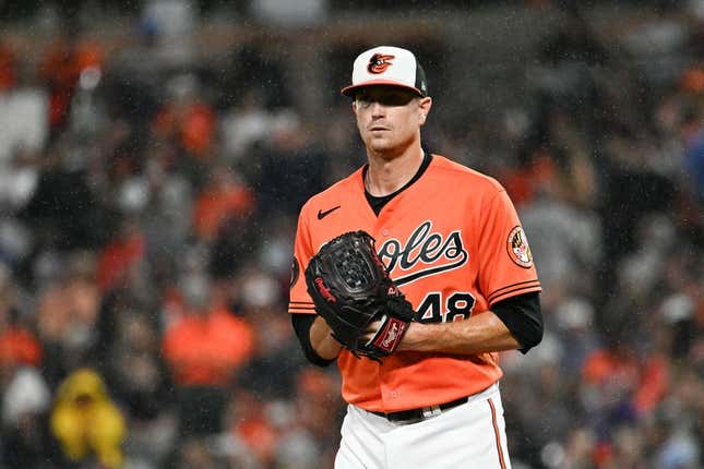 Sep 30, 2023; Baltimore, Maryland, USA;  Baltimore Orioles starting pitcher Kyle Gibson (48) stands on the pitcher&#39;s mound as rain falls during the second inning against the Boston Red Sox at Oriole Park at Camden Yards.