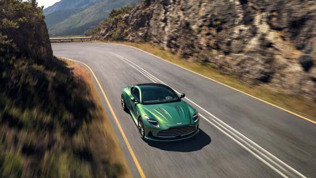 A photo of a green Aston Martin DB12 sports car. 