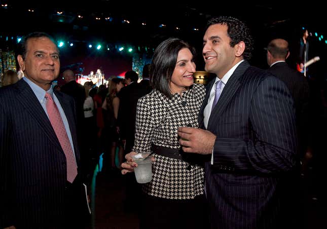 FILE - In this Jan. 18, 2011 file photo, Dr. Love Paul, left, Pearl Paul, and their son Nate Paul, right, attend the 2011 Texas Inaugural Celebration at the Palmer Events Center in Austin, Texas. The Texas businessman at the center of the scandal that led to the historic impeachment of state Attorney General Ken Paxton has been charged with additional federal crimes. The new indictment of Nate Paul alleges that he defrauded business partners, adding to earlier charges that the Austin-based real estate developer made false statements to mortgage lenders to obtain $172 million in loans. (Laura Skelding/Austin American-Statesman via AP, File)