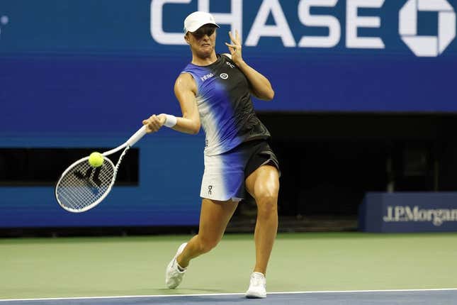 Sep 3, 2023; Flushing, NY, USA; Iga Swiatek of Poland hits a forehand against Jelena Ostapenko of Latvia (not pictured) on day seven of the 2023 U.S. Open tennis tournament at USTA Billie Jean King National Tennis Center.