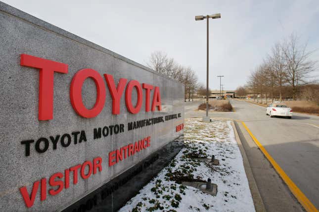 FILE - A car drives past the entrance to the Toyota Motor Manufacturing plant is seen in Georgetown, Ky., Jan. 27, 2010. Toyota says it will invest $1.3 billion at its huge factory complex in Georgetown, in part so it can build an all-new three-row electric SUV to be sold in the U.S. The company says the money will help with future electric vehicle production, including the addition of a line to assemble battery cells into packs for other EVs. But it won’t add any new jobs to the complex, which now employs nearly 9,400 workers. The investment brings to nearly $10 billion the amount of money that Toyota has spent at the plant, the company said in a statement Tuesday, Feb. 6, 2024. (AP Photo/Ed Reinke, file)