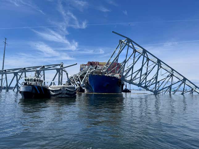 FILE - The collapsed Francis Scott Key Bridge in Baltimore is pictured Sunday, March 31, 2024, as divers assist crews in the complex and meticulous process of removing steel and concrete. The Small Business Administration is providing assistance to those affected by the Maryland bridge collapse. Small businesses in the Mid-Atlantic region are eligible for low-interest, long-term Economic Injury Disaster Loans of up to $2 million.  (AP Photo/Mike Pesoli)