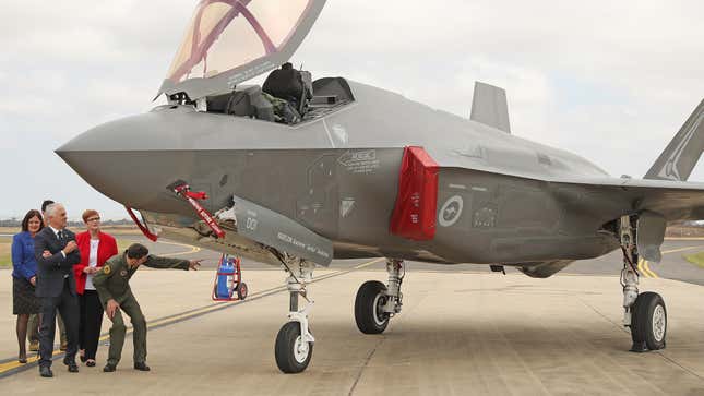 Australian Prime Minister Malcolm Turnbull inspects a F-35a Joint Strike Fighter at the Avalon Air Show, Australia, 2017. The F-35A is manufactured by U.S. defense contractor Lockheed Martin.