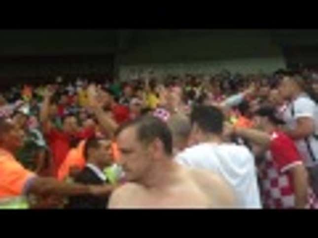 Croatia Vs. Mexico Fan Brawl Features Shirtless, Smoking Hero