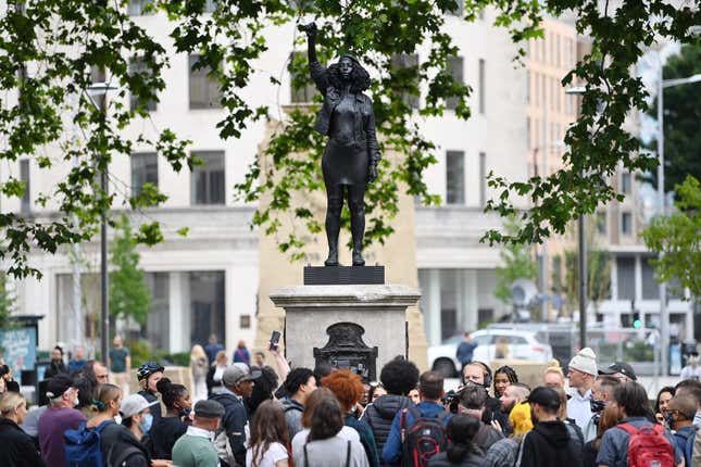 Image for article titled Monument of British Slave Trader Replaced With Statue of Black Lives Matter Protester