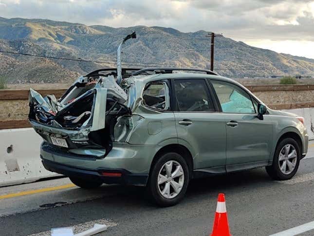 Image for article titled A Catastrophic Failure Caused A Tractor-Trailer Wheel To Slam Into This Subaru