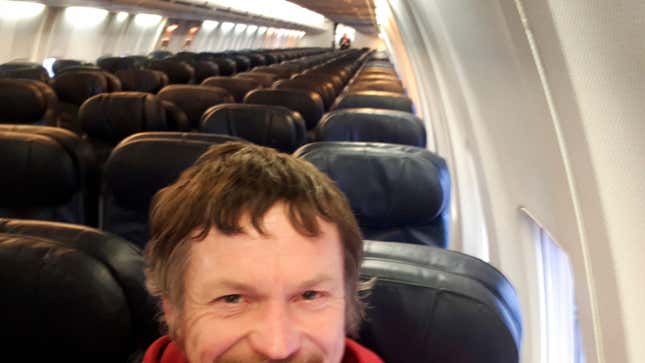 Skirmantas Strimaitis takes a selfie onboard a Boeing 737-800 airplane, taking off from Vilnius, Lithuania, March 16, 2019, as the only passenger aboard. The aircraft with two pilots and five crew members and which usually can sit up to 188 people, flew to Bergamo, Italy. 