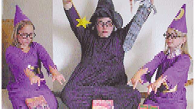 Above: Three young <i>Harry Potter</i> fans in Winter Park, FL, recite an ancient Satanic incantation.