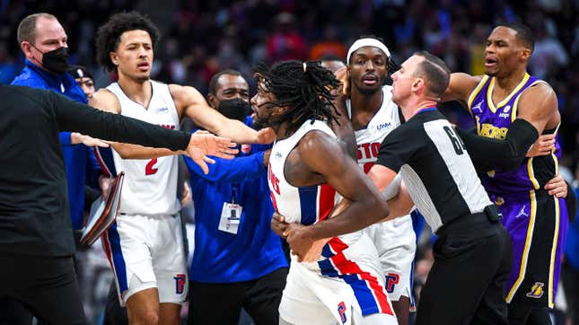 Teammates, coaches, and officials attempt to de-escalate the situation between Isaiah Stewart and LeBron James in Detroit.