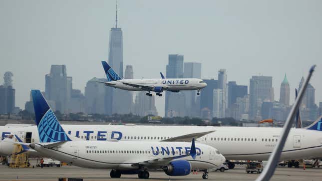 A United Airlines plane lands at Newark Liberty International Airport 