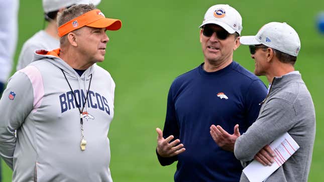  Denver Broncos HC Sean Payton, (l.) talks to GM George Paton, and owner and CEO Greg Penner (r.)