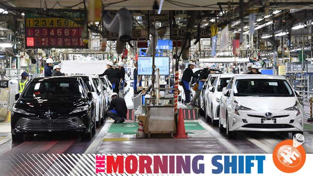 A photo of cars rolling off two production lines at a Toyota factory. 