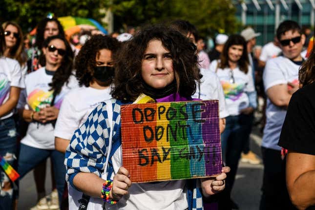 Members and supporters of the LGBTQ community attend the “Say Gay Anyway” rally in Miami Beach, Florida, on March 13, 2022. - Florida’s state senate on March 8 passed a controversial bill banning lessons on sexual orientation and gender identity in elementary schools, a step that critics complain will hurt the LGBTQ community. 