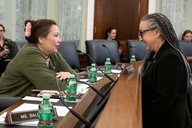 Sen. Tammy Duckworth, D-Ill., left, talks with Dr. Tracy Dillinger, Manager for Safety Culture and Human Factors, National Aeronautics and Space Administration before the start of a Senate Commerce, Science, and Transportation hearing to examine the FAA Organization Designation Authorization (ODA) Expert Panel Report on Wednesday, April 17, 2024, in Washington. (AP Photo/Kevin Wolf)