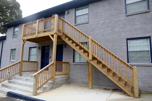 This photo shows one of the the Veterans Empowerment Organization apartment buildings that offer permanent housing for 41 veterans, Tuesday, Oct. 31, 2023 in Atlanta. Veterans pay a small amount of rent, with funds from the Department of Veterans Affairs making up the difference. (AP Photo/R.J. Rico)