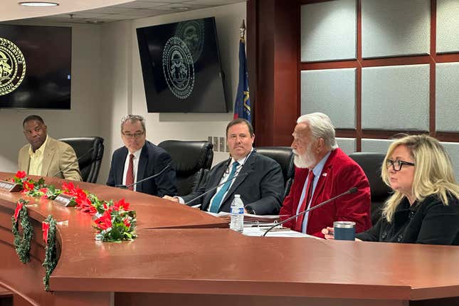 FILE - The five Republican members of the Georgia Public Service Commission discuss a rate increase for Georgia Power Co. to pay costs at the utility&#39;s Vogtle nuclear power plant, Dec. 19, 2023, in Atlanta. A bill passed Thursday, March 21, 2024, by Georgia lawmakers would add an extra two years to the terms of commissioners in response to a court case. (AP Photo/Jeff Amy, File)