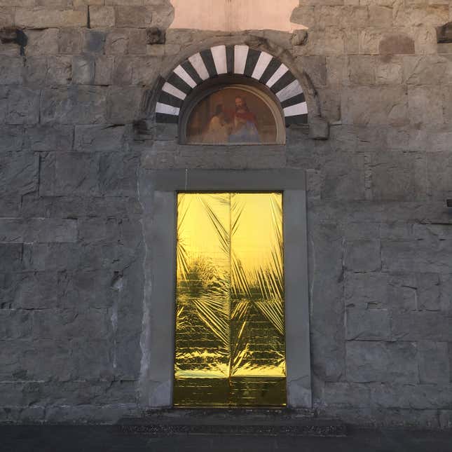 The main door of Santomato’s church of Maria Assunta in Pistoia, Tuscany.