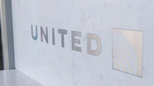 The United Airlines logo on a piece of wall